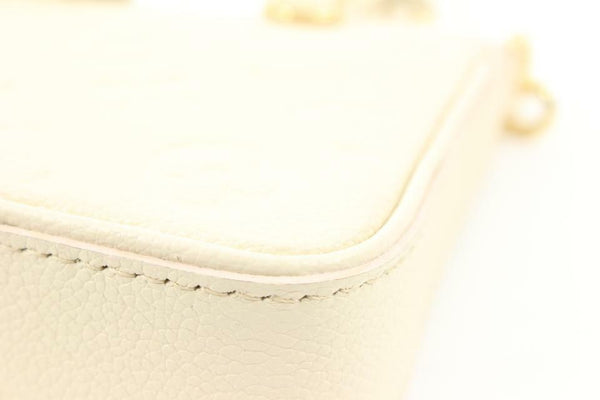 Louis Vuitton Cream Monogram Empreinte Easy Pouch on Strap Crossbody  1LV1114a For Sale at 1stDibs