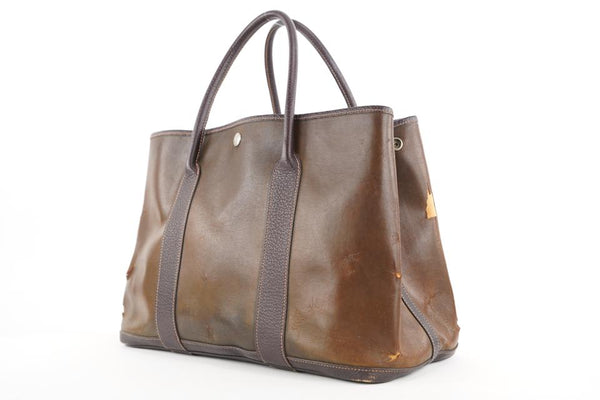 A CHOCOLATE BROWN IA AND BUFFALO LEATHER GARDEN PARTY BAG