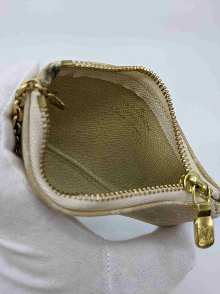 Key pouch leather small bag Louis Vuitton Beige in Leather - 26099678