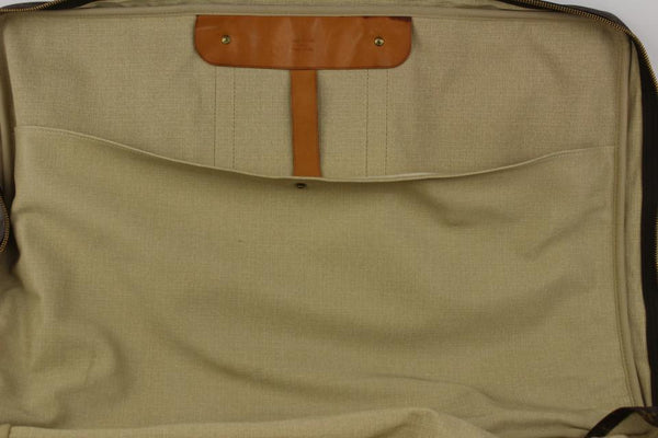 Vintage Louis Vuitton Monogram Rolling Garment Bag for sale at