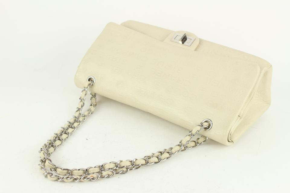 Chanel Ivory Embossed CC Calfskin Maxi Double Flap SHW 2cc1108