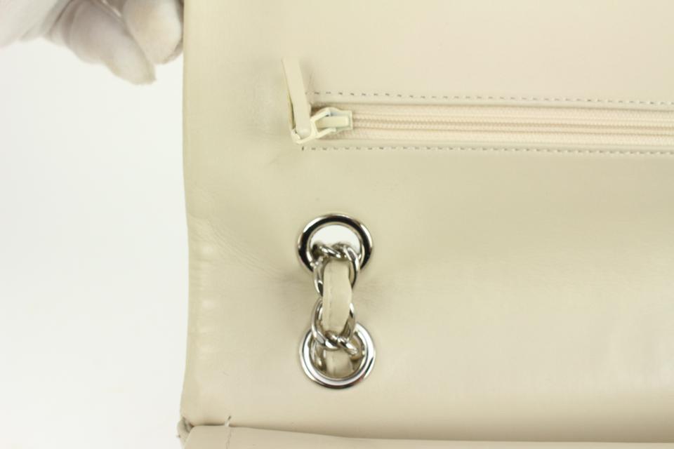 Chanel Ivory Embossed CC Calfskin Maxi Double Flap SHW 2cc1108