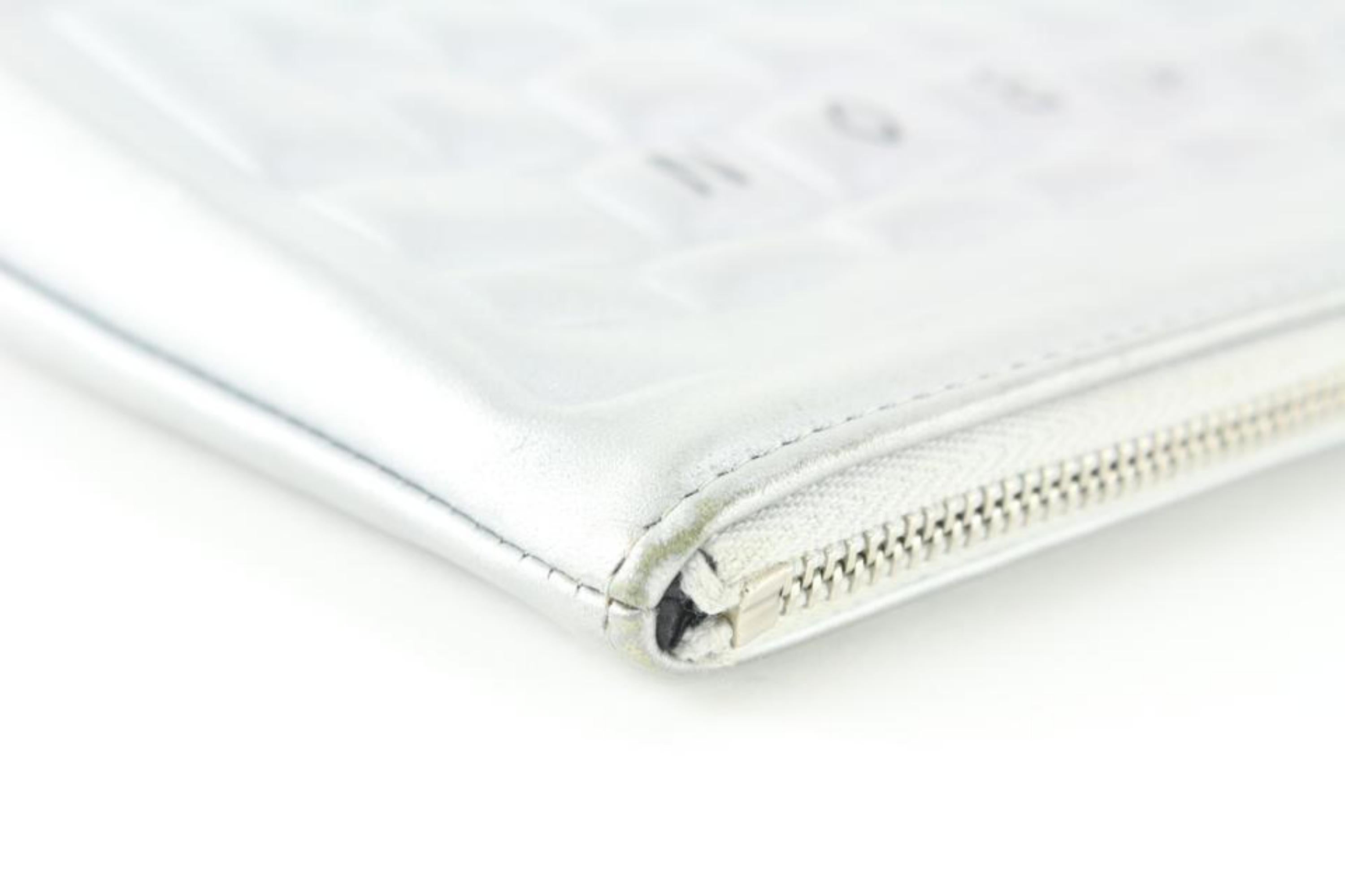 Chanel Silver Keyboard Clutch 1C1027 – Bagriculture