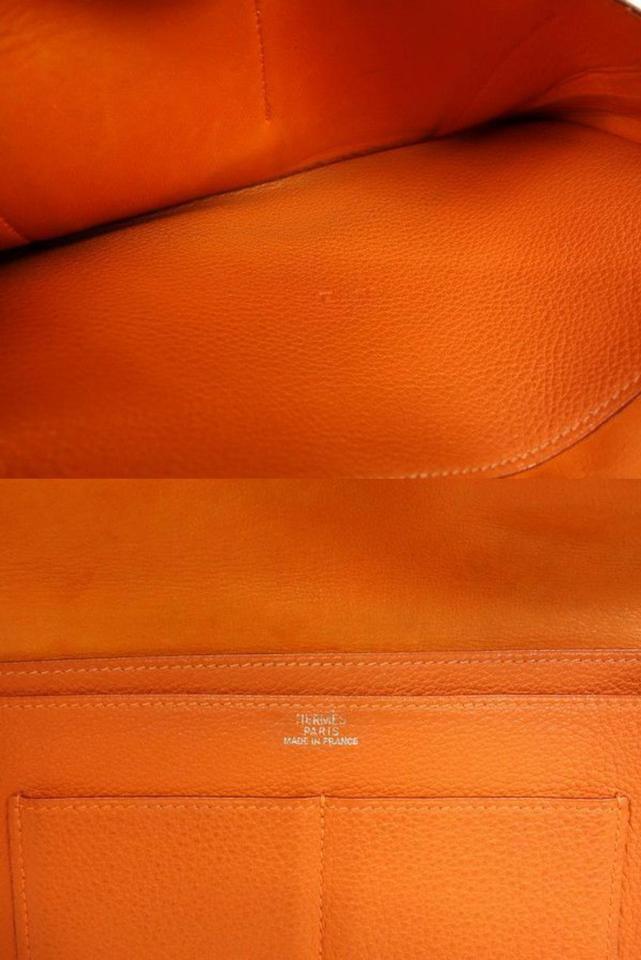 Hermès Orange Togo Leather Dogon Wallet