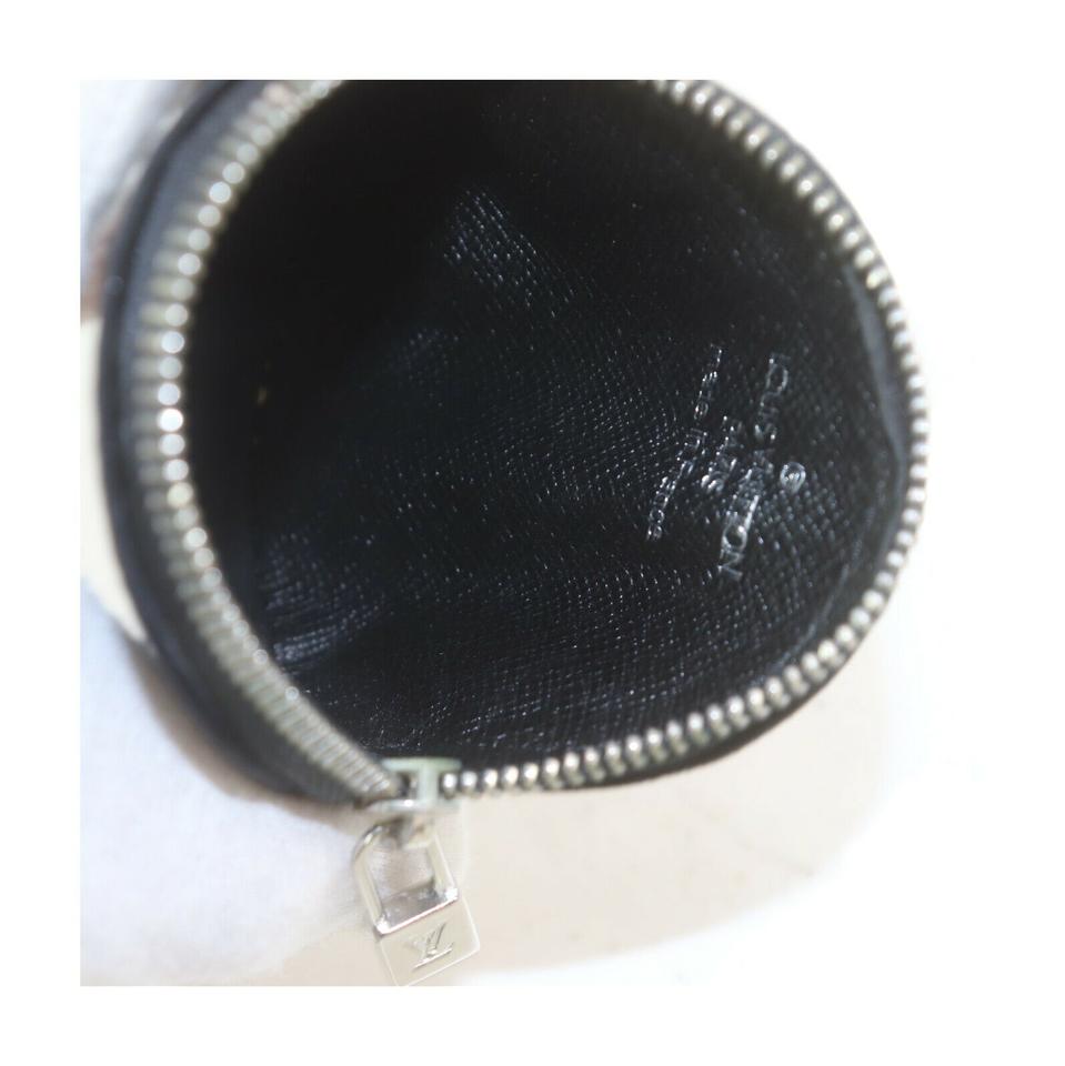 Louis Vuitton Black Satin Monogram Conte de Fees Apple Round Coin Purse  ref.315948 - Joli Closet