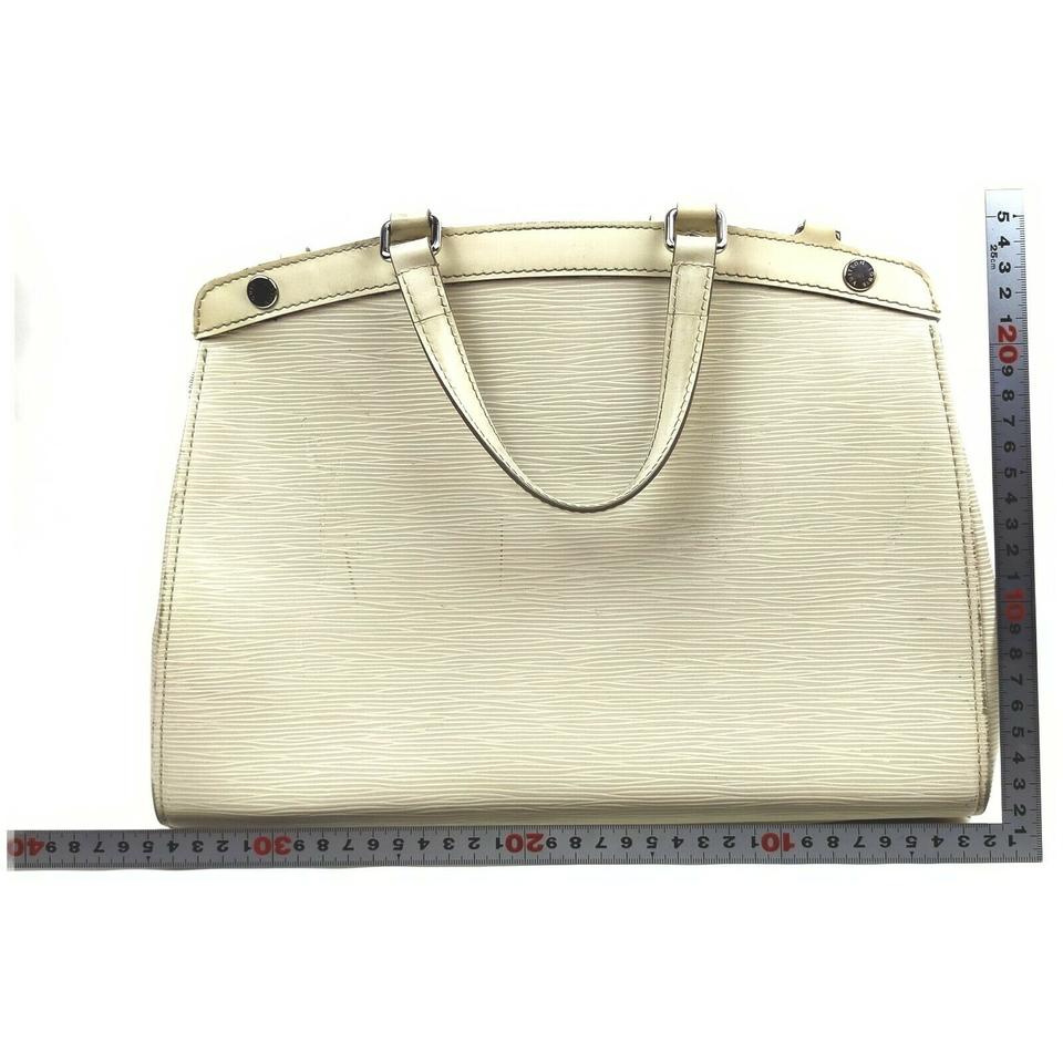 Lockme leather crossbody bag Louis Vuitton White in Leather - 24532624