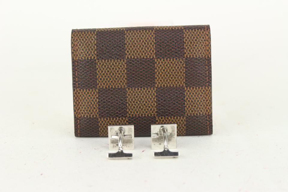 Louis Vuitton, a pair of cufflinks in a damier ebene case. - Bukowskis