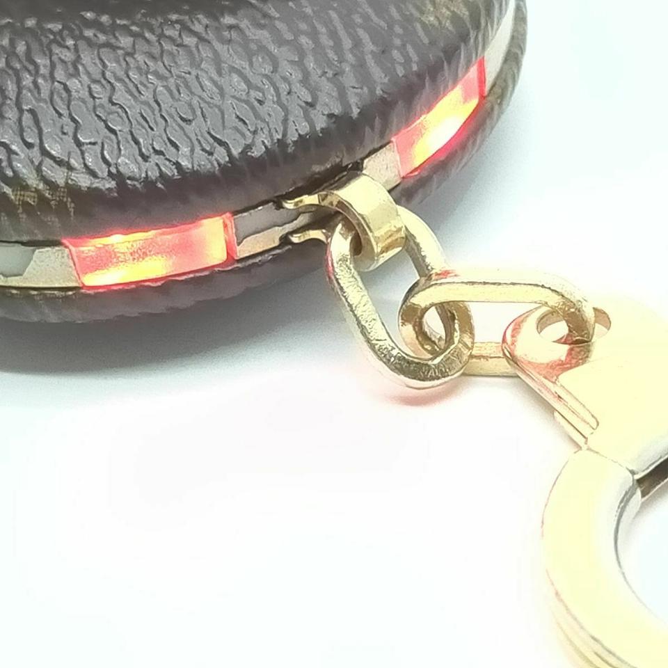 Key ring Louis Vuitton Brown in Synthetic - 31612250