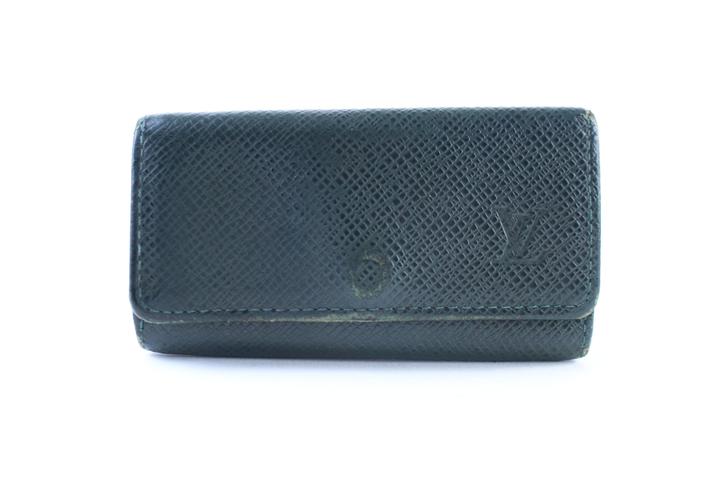 Louis Vuitton Black Taiga Leather Silver Logo Keychain Bag Charm Penda –  Bagriculture