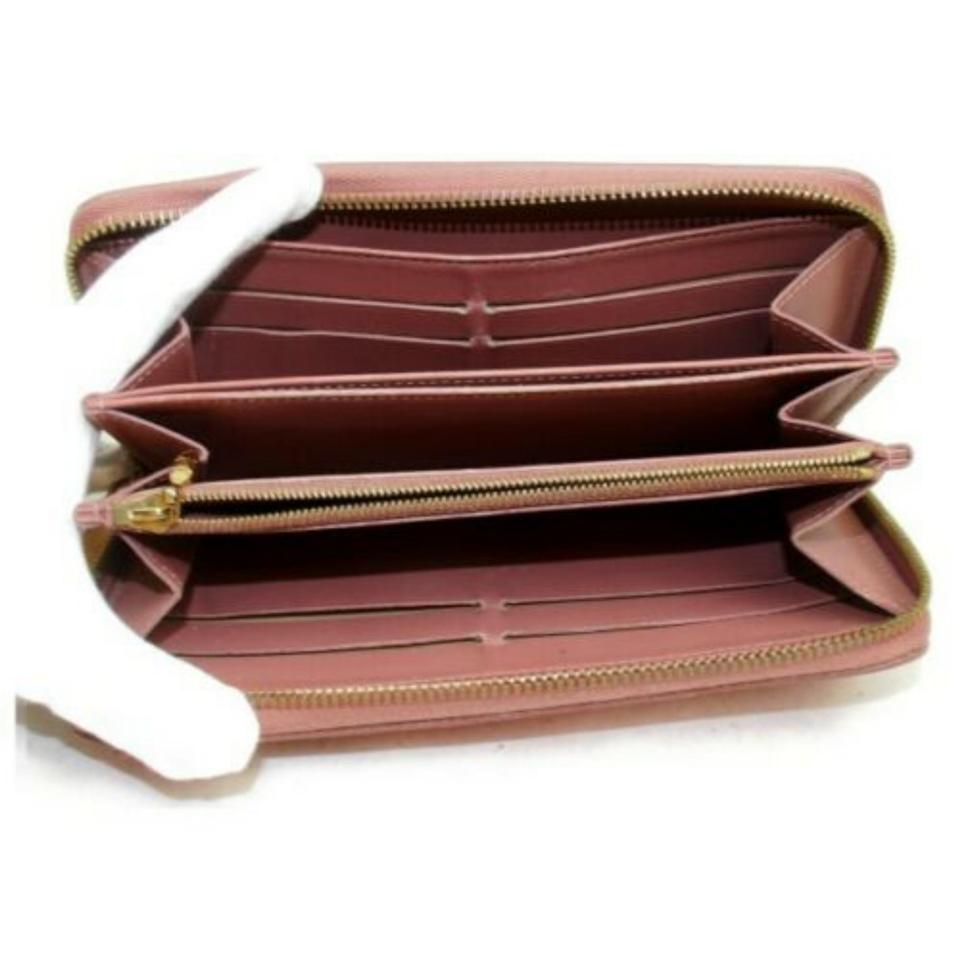 Louis Vuitton, Bags, Louis Vuitton Pink Zippy Wallet Monogram Vernis Ikat  Flower