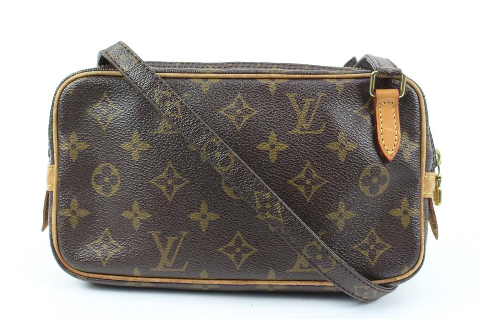 Vintage Unisex Louis Vuitton Marly Bandouliere (Camera Bag/Crossbody Style)  in Brown Monogram. Made in France Circa 1980. New main zip…