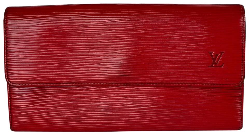 079 Pre-Owned Authentic Louis Vuitton Red Epi Leather International Wallet  Date code: CA1916