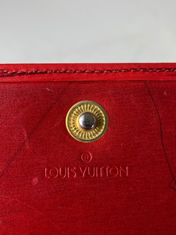 Louis Vuitton Sarah wallet with red interior. Gently - Depop