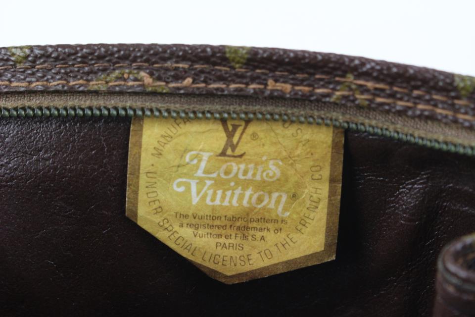 Poche toilette cloth vanity case Louis Vuitton Brown in Cloth