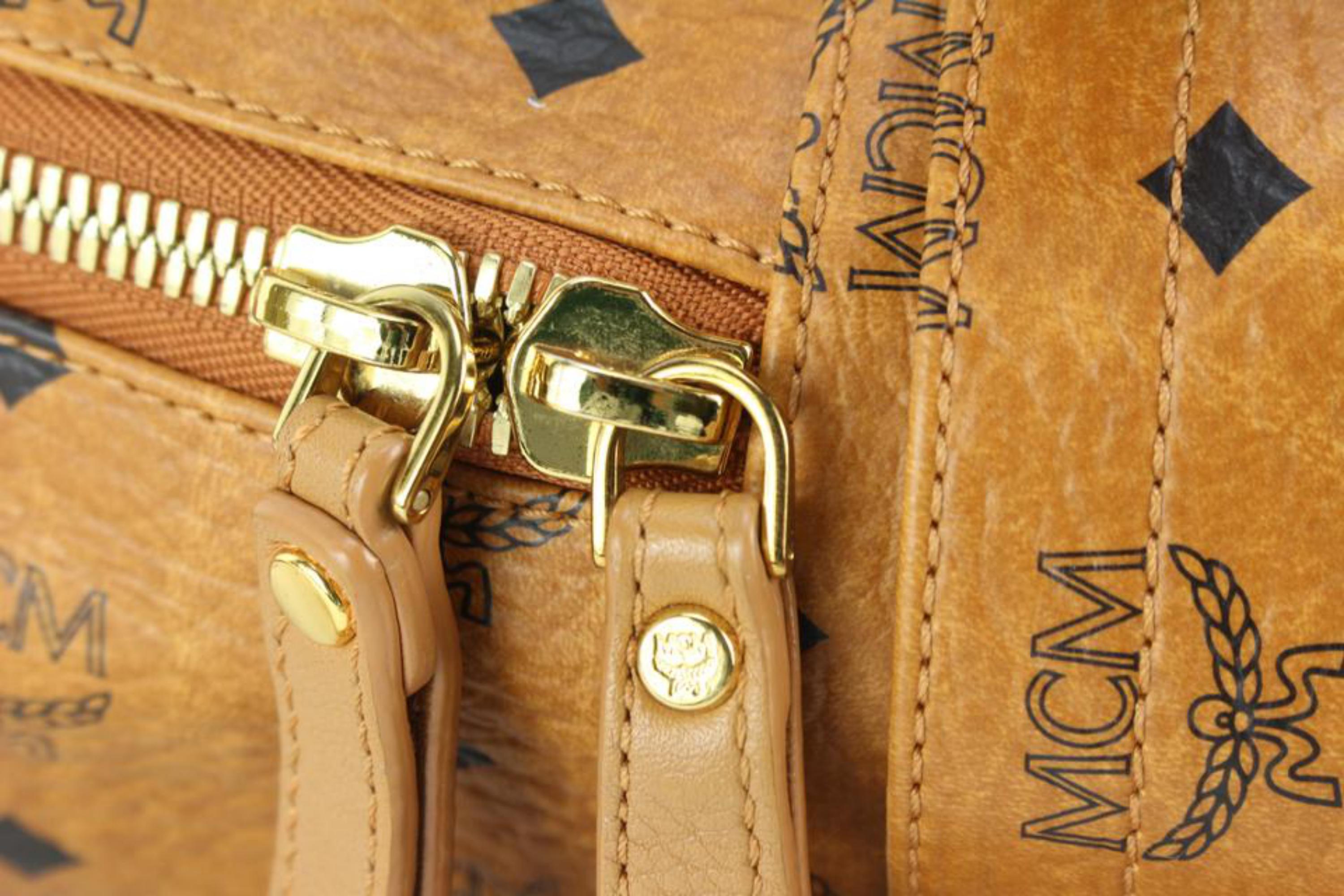 MCM Cognac All Over Stud Stark Backpack 90m56s – Bagriculture